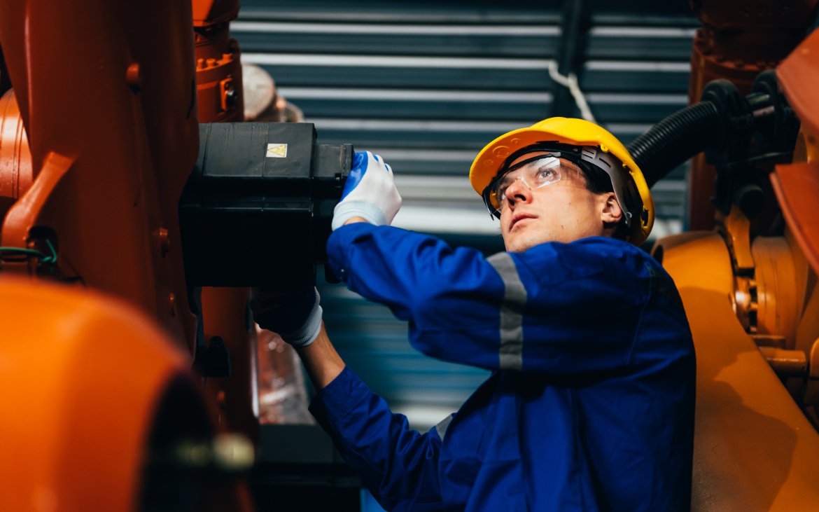 professional maintenance worker with machine robot